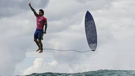 Right place, right time: The story behind the viral surfing photo from the Paris Olympics